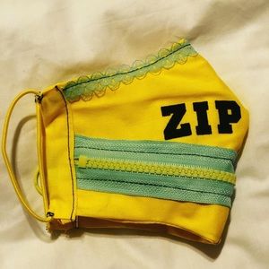 Yellow and light blue zip the lips face mask